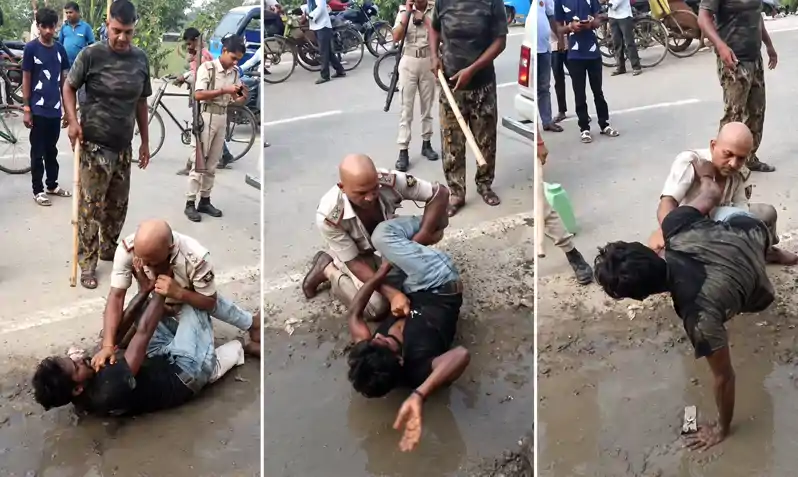 सड़क पर पुलिस और युवक के बीच उठापटक, वर्दी फाड़ी, Video वायरल सड़क पर पुलिस और युवक के बीच उठापटक, वर्दी फाड़ी, Video वायरल