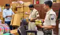 दवा दुकान में ड्रग कंट्रोलर टीम का छापा, अनियमितता के साथ मिली शराब की बोतलें, तीन गिरफ्त में