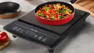 गैस संकट के डर से लोग हुए सतर्क, Amazon पर चार दिनों में 4 लाख इंडक्शन चूल्हों की हुई बिक्री