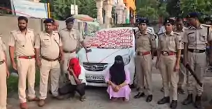 महिला कर रही थी शराब का धंधा, लग्जरी कार से भारी शराब बरामद